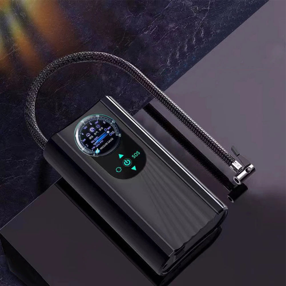 Black electronic device with digital display on a dark surface high-pressure air pump