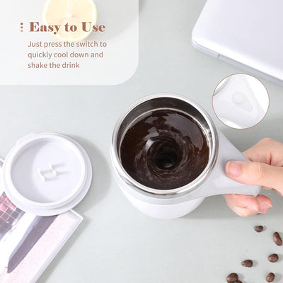 White mug with dark liquid For Kitchen, surrounded by coffee beans on a light gray surface.